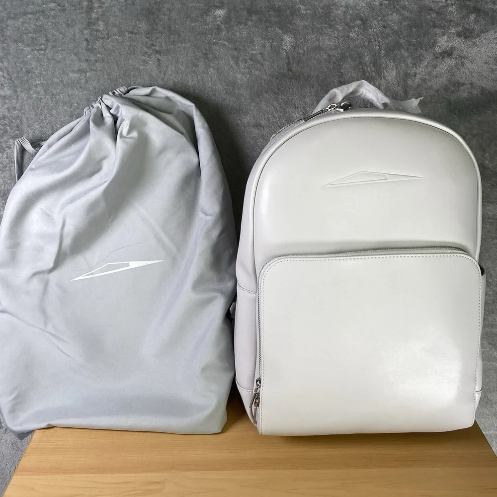 Tesla Cybertruck Elevate Backpack Grey Vegan Leather Tesla Store w/ Satin Cover